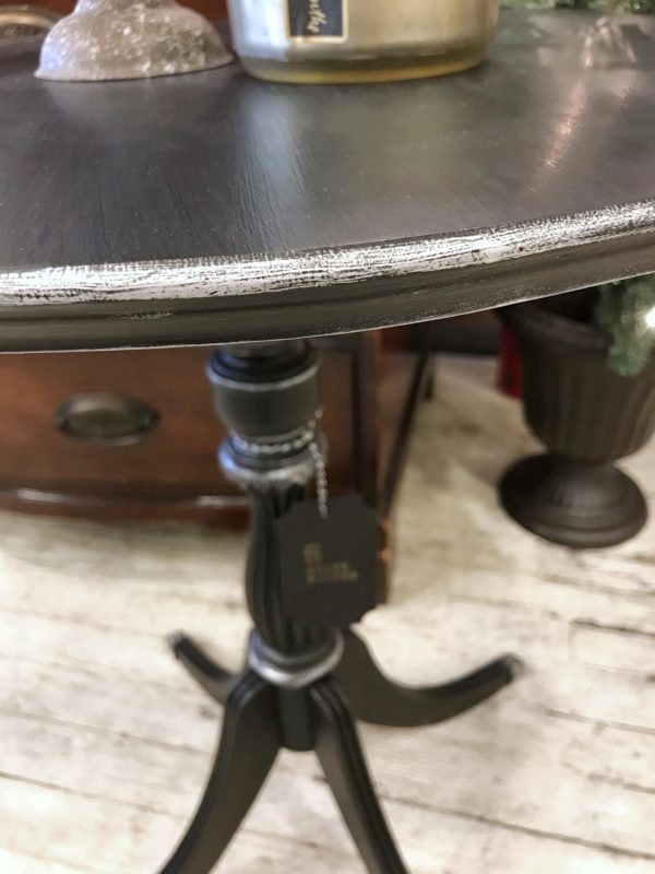 BLACK AND SILVER PEDESTAL TABLE